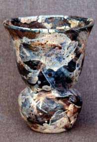 Stoneware vase thrown , with coloured slips (12" ht )