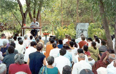 Dr. M.V.Nadkarni speaking under the trees in the garden
