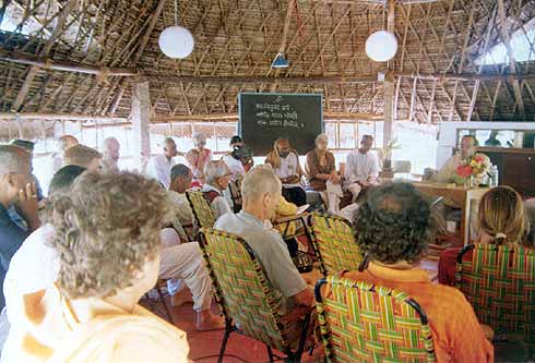 Dr. Ananda Reddy speaking in the shelter