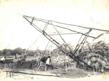 Erecting the windmill structure, great fun...