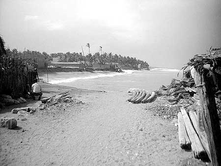 The beach has disappeared after August 2002.