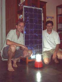 Jos (left) and Hemant with a solar lighting set
