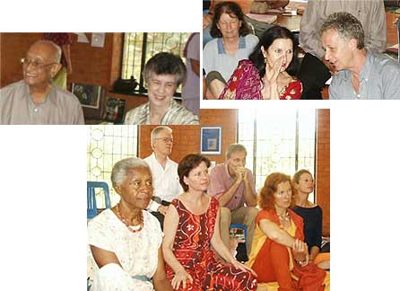 Dayanand and Sonia of Singapore; Savitri and Wolfgang from Berlin, discussions on the International Zone.