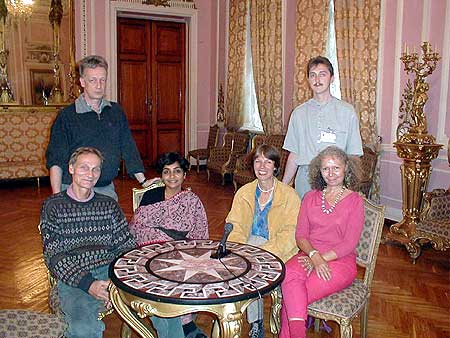 Preparing for an interview with Russian TV: standing Wolfgang, chairperson of the AVI Association and Dimitri of AVI Liaison Russia; sitting: Aurovilians Peter, Bindu, Tine and Bhaga