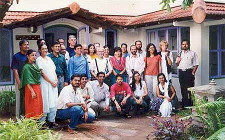 Organisers and participants posing before Auroville's Merriam Hill centre in Center Field