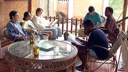 Teachers of the Auroville Language Lab are meeting regularly. Initiative takers of the Lab, Tapas and Mita, are sitting here on the left.