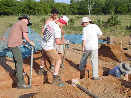 Stamping and tamping in the trench