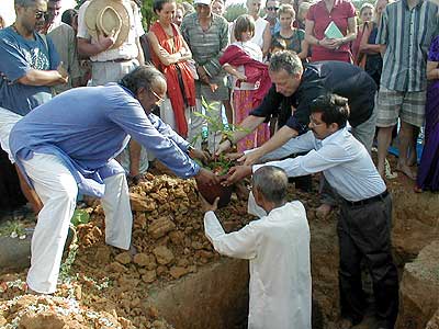 ..after which Ananda Reddy handed over the Service tree to be planted on the site.