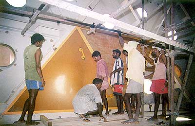 The mounting of one of the panels on the inner surface of Matrimandir's spaceframe